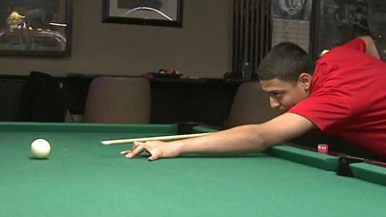 Young Sergio Rivas practicing his stroke